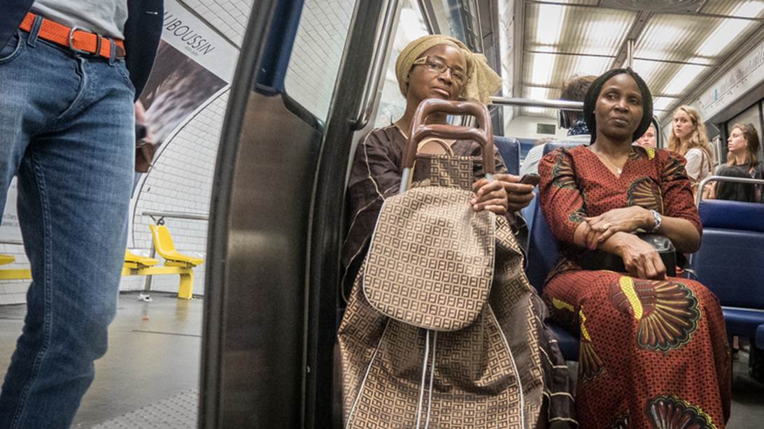 two woman on the train sitting